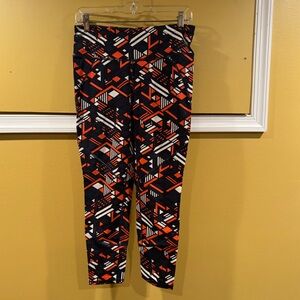 Sweaty Betty orange and blue art deco print The Power leggings size M